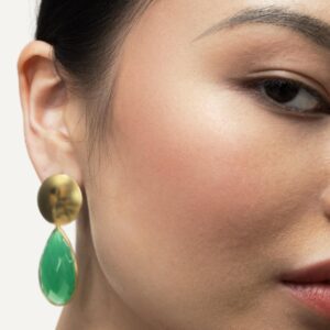 Green onyx drop earrings on model.