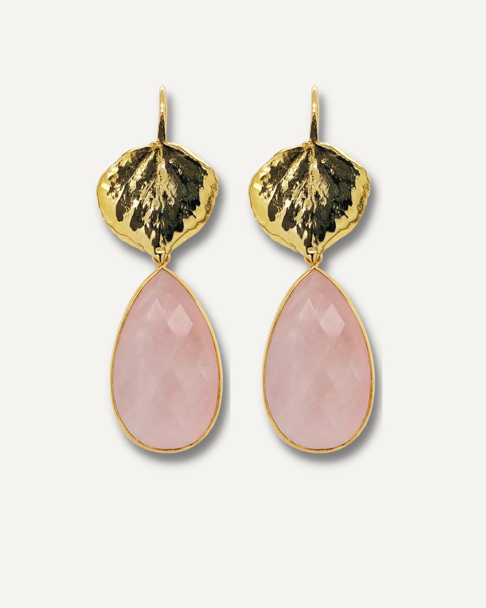 Gemstone dangle earrings with rose quartz stones.