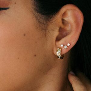 Chunky huggie earrings.