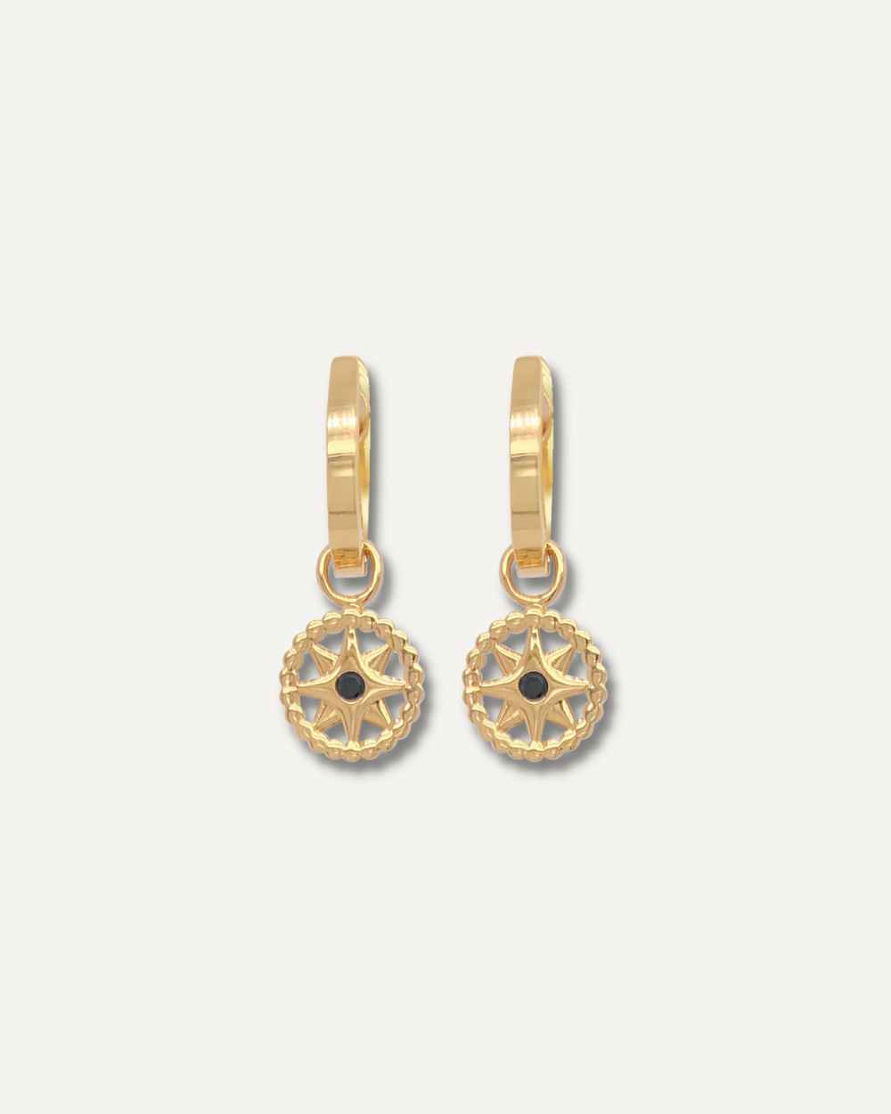 Hoop earrings with charm.
