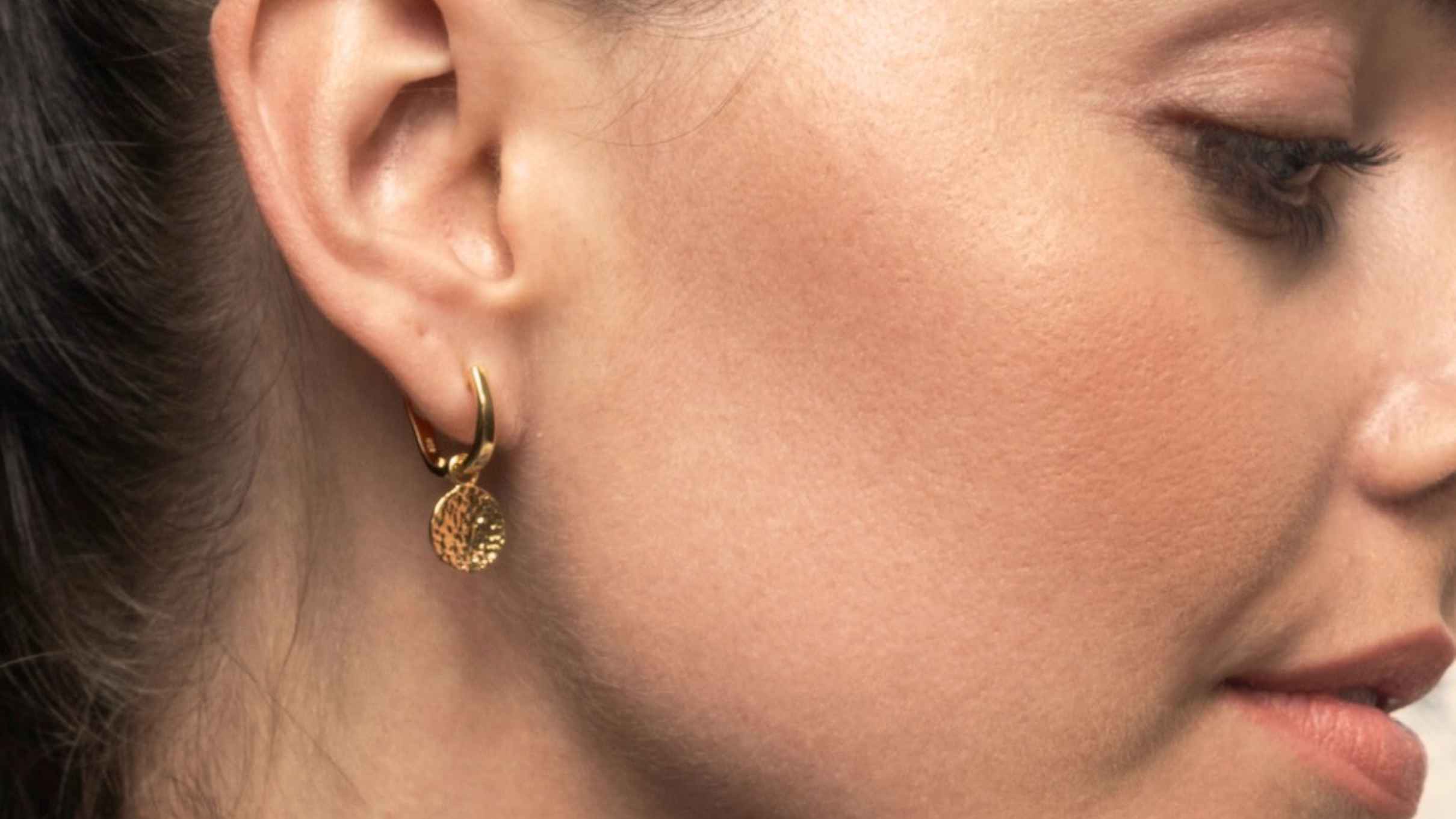Iconic charm earrings.